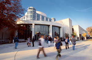 Picture of people walking in front of the library